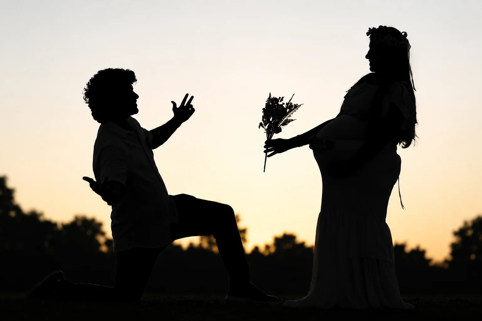 FilmsByHari cinematic photography — silhouette proposal portrait at sunset